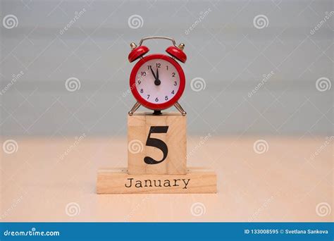 January 5th. Day 5 Of January Set On Wooden Calendar On Blue Background ...