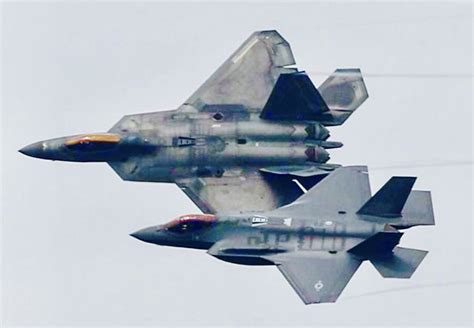 F-22 Raptor vs. F-35 Lightning II ; Comparing the Roles and Capabilities of the United States ...