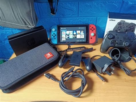 Nintendo Switch V1 JB 128gb Full Games, Video Gaming, Video Game Consoles, Nintendo on Carousell