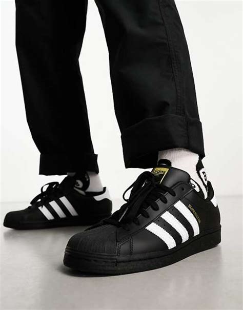 adidas Originals Superstar trainers in black | ASOS