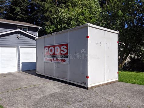 Street View of a PODS Moving and Storage Cube Sitting in a Residential ...