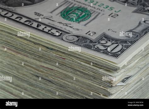 Stack twenty dollar bills hi-res stock photography and images - Alamy