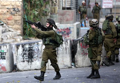 Israeli troops kill Palestinian teenager for 'rock-throwing' in Hebron ...