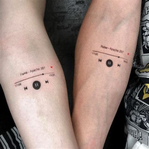 two people with matching tattoos on their arms, one has music notes and ...