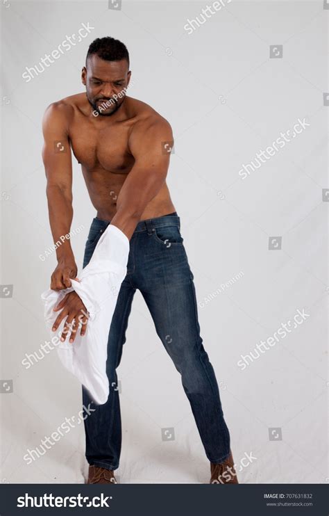 Handsome Black Man Taking His Shirt Stock Photo 707631832 | Shutterstock