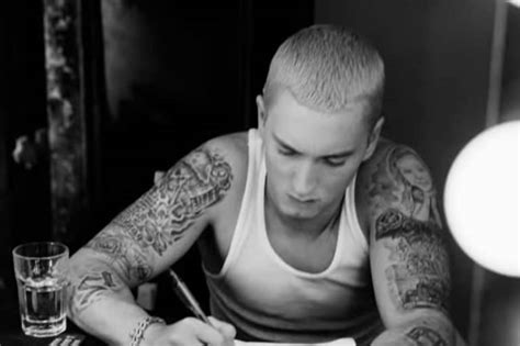 A Guide To 9 Eminem Tattoos and What They Mean