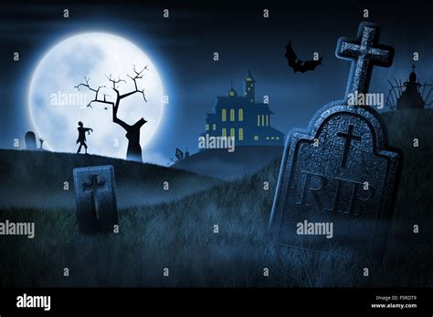 Spooky Halloween night. Foggy cemetery and haunted house on background ...