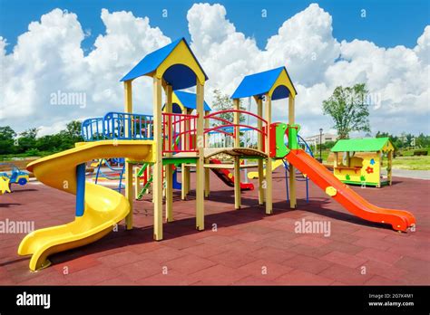 Children playground equipment. Colorful playground empty. Outdoor playground set. Play area ...