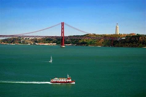 Tagus river and the Lisbon bridge. Lovely to cross the river by those ...