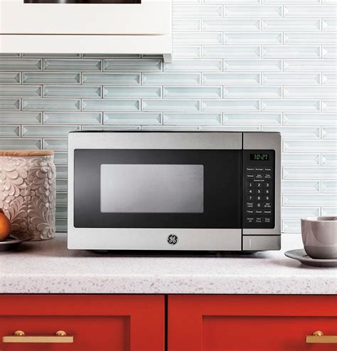 GE 0.7 Cu. Ft. Compact Microwave Stainless Steel JES1072SHSS - Best Buy