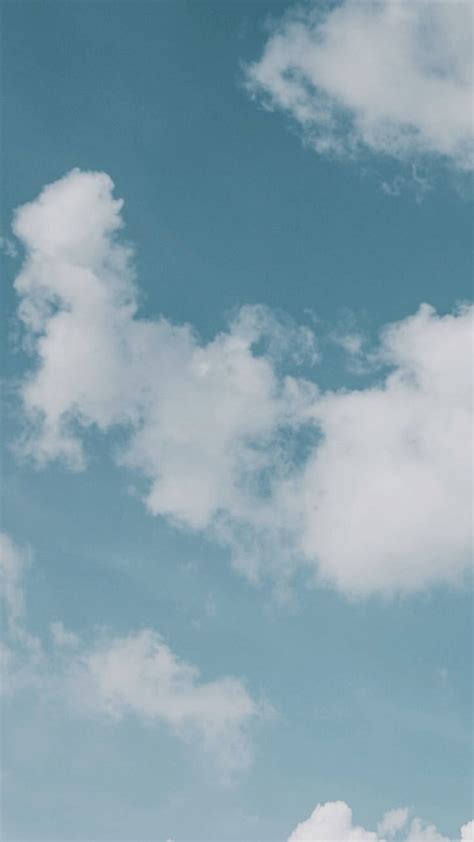 Download Aesthetic Blue Fluffy White Clouds Wallpaper | Wallpapers.com