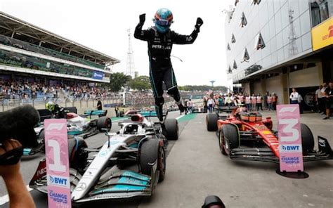 Brazilian Grand Prix: George Russell holds off Lewis Hamilton to take ...