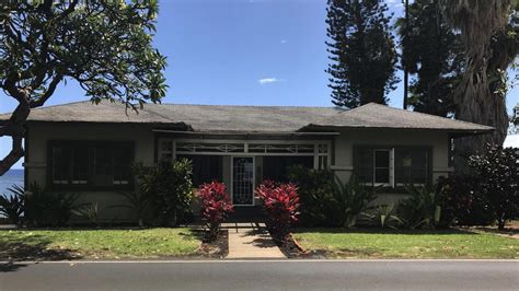 The red-roofed home that survived the fires in Lahaina is now a ray of hope : NPR