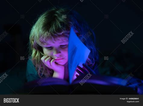 Child Reading Book Bed Image & Photo (Free Trial) | Bigstock