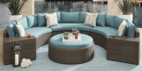 Rialto Brown 5 Pc Curved Outdoor Sectional with Aqua Cushions - Rooms To Go