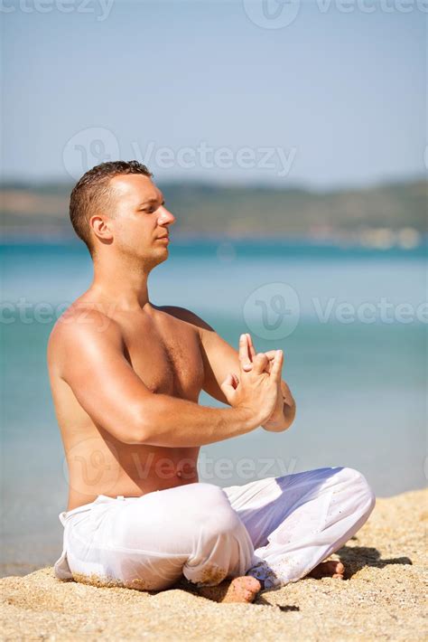 Meditation on the beach 14226797 Stock Photo at Vecteezy