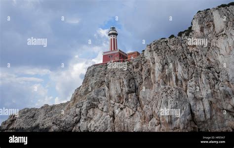 Rocky coast with lighthouse Punta Carena Lighthouse , Capri, an island, Bay of Naples, Italy ...