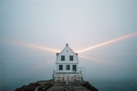 "A Beam Of Light From A Maine Lighthouse Can Be Seen Shining Through ...