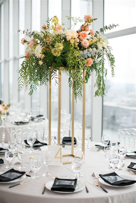 Round Tables with Elegant Tall Centerpieces