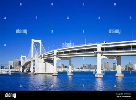 Rainbow Bridge and Tokyo Tower Stock Photo - Alamy