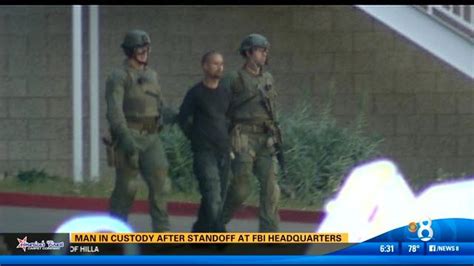 Man in custody after standoff at FBI headquarters - CBS News 8 - San ...