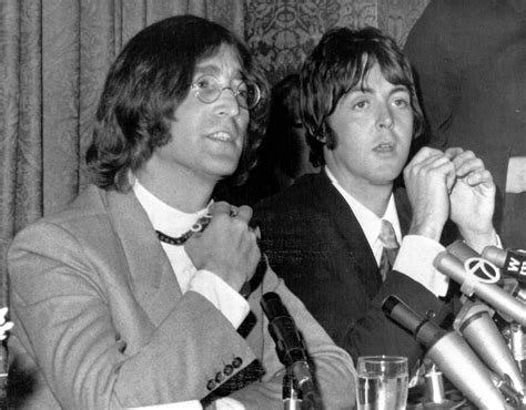 John Lennon and Paul McCartney at a press conference in New York, 14 ...