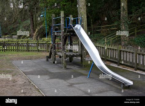 Children's Playground Slide and Blue Seating by the river at Matlock Bath Derbyshire.England ...