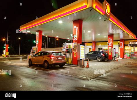 Petrol gas station with night lights Stock Photo - Alamy