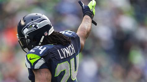 Backside Of Marshawn Lynch Wearing Blue Sports Dress And Helmet HD ...