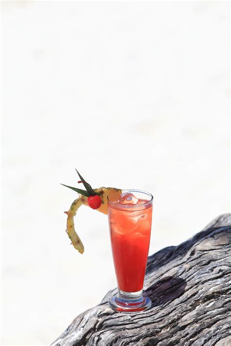 fruit cocktail on a tropical island beach 10325364 Stock Photo at Vecteezy