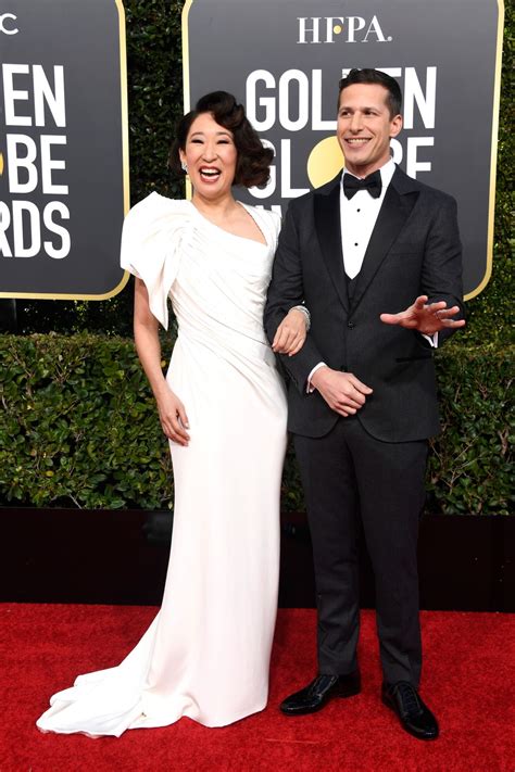 SANDRA OH and Andy Samberg at 2019 Golden Globe Awards in Beverly Hills ...