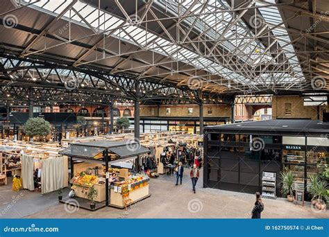 Shops in Old Spitalfields Market in London Editorial Stock Image - Image of architecture, stall ...