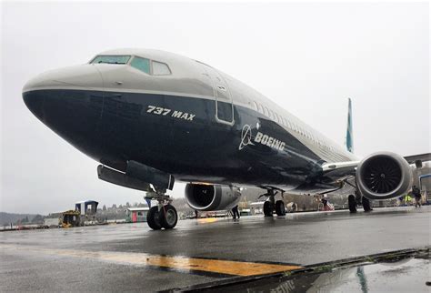 Boeing 737 MAX 9 jet's rollout brightens up a gloomy day in Renton