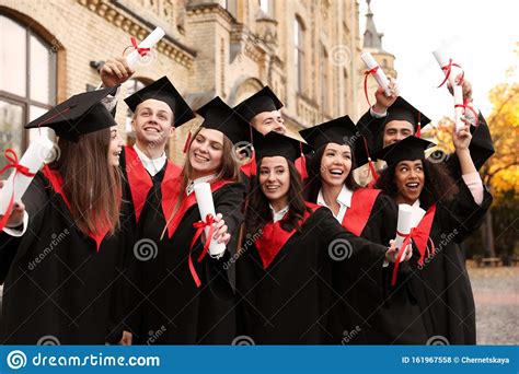 Happy Students with Diplomas. Graduation Ceremony Stock Photo - Image of ceremony, knowledge ...