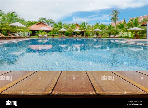 Blurred Swimming Pool Background with Perspective Wood Floor Stock ...