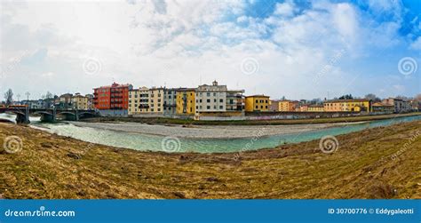 River with City Houses and Bridge in Parma - Italy Stock Photo - Image of skyline, river: 30700776