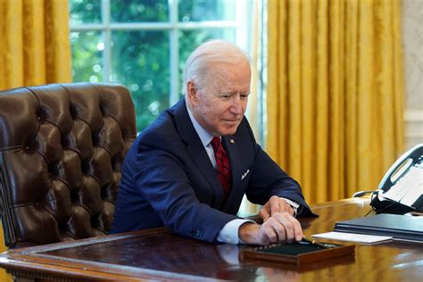 In Time-Saving Measure, Biden Signs Mile-Long Executive Order Reversing ...