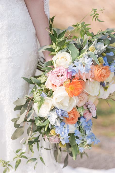 Pink, orange, and blue flowers for a large wedding bouquet | Orange wedding flowers, Blue ...
