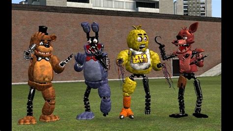 five cartoon characters are standing in the grass