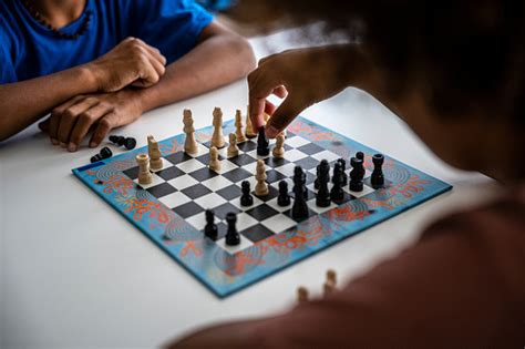 Hands In Action Two Black Kids Play Chess At Home Stock Photo ...