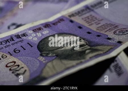 Mahatma Gandhi in one hundred rupee Indian currency. Currency ...