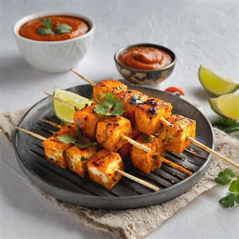 Premium Photo | Paneer tikka is an indian cuisine dish with grilled ...