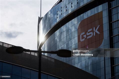 The GSK Plc logo on the exterior of the headquarters of the company ...