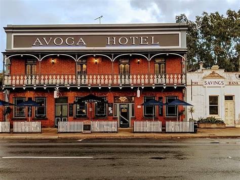 an old red brick building with awocaa hotel written on it's front