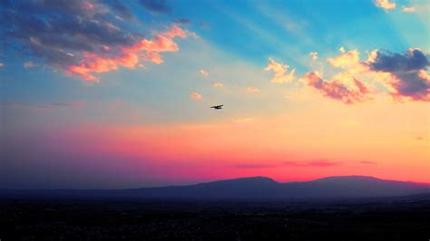 Airplane, clouds, sunset, mountains HD wallpaper | Wallpaper Flare