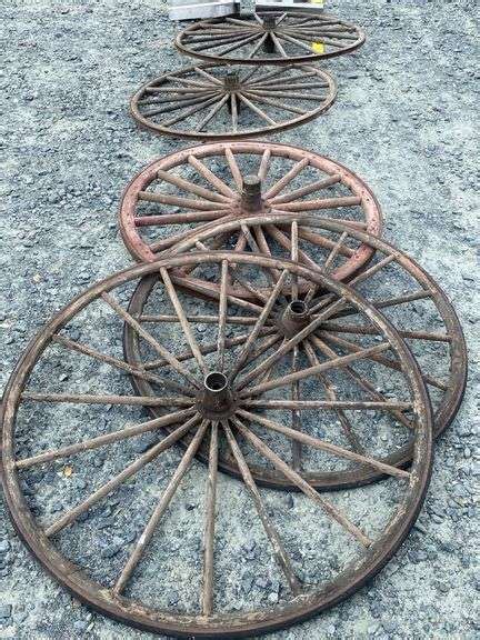 5 Antique Iron Banded Wooden Buggy Wheels - Dixon's Auction at Crumpton