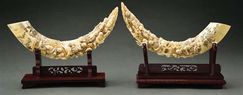 Lot Detail - PAIR OF CARVED IVORY TUSKS.