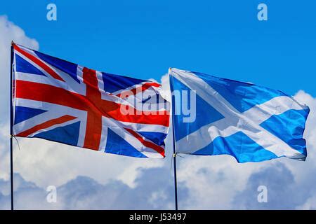 British Union Jack and Scottish Saltire on a top of City Chambers in ...