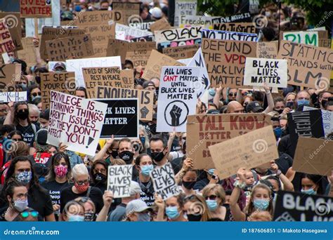 Junteenth Protestors Holding Up Signs during Anti-racism March ...