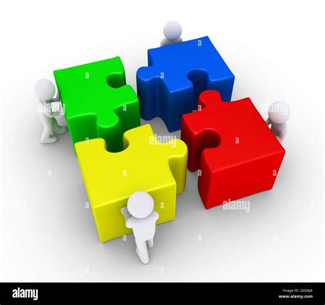 Four people join the big puzzle pieces Stock Photo - Alamy